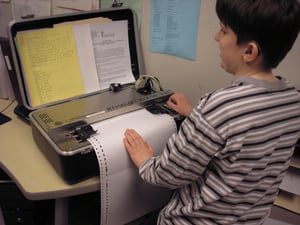 Jack at a braille embosser